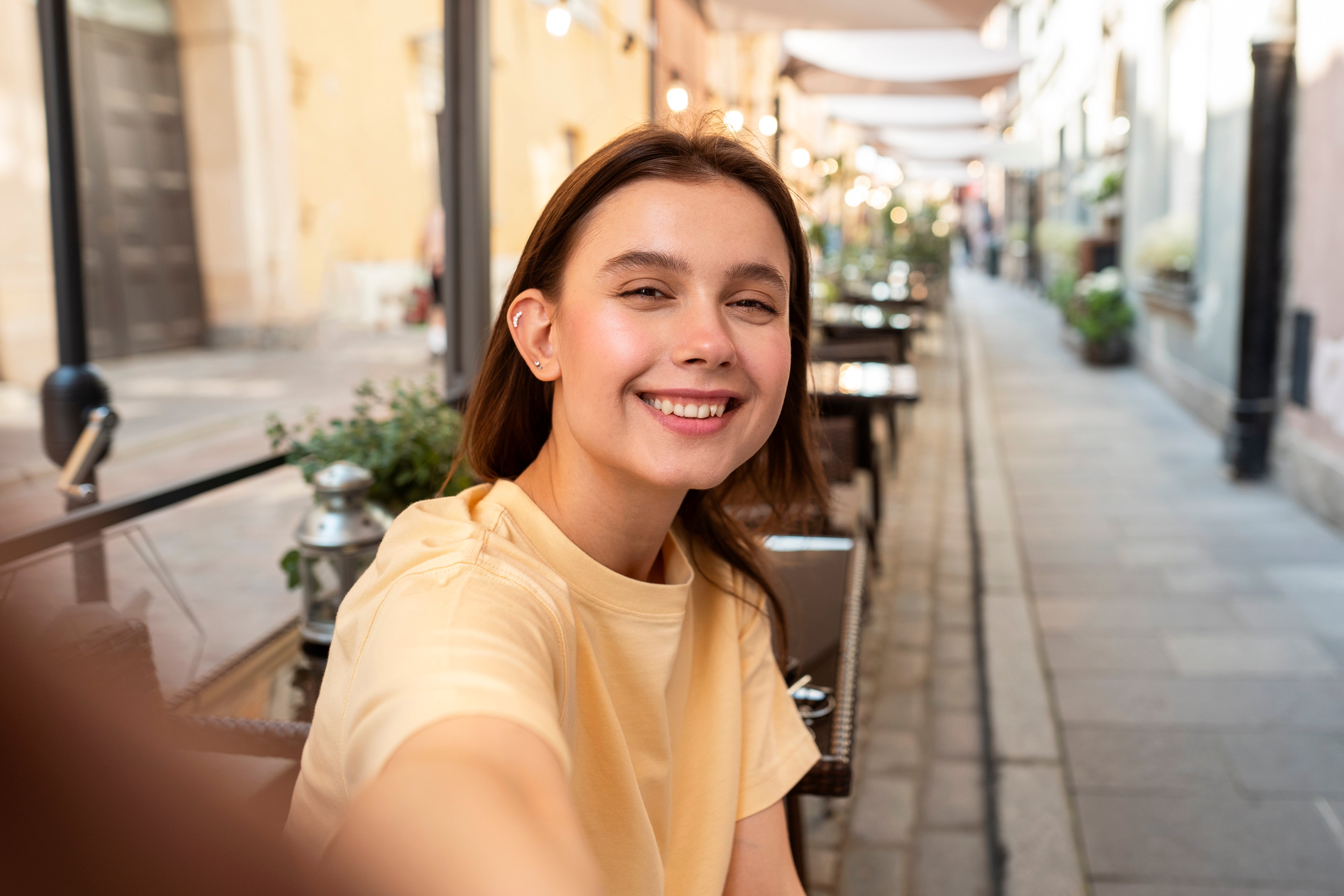 files/medium-shot-smiley-woman-taking-selfie-outside.jpg